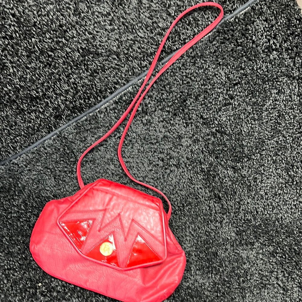 Vintage shouldeclutch bag. Small stain on front. Bottom 10 1/2 Middle 12 Top 6